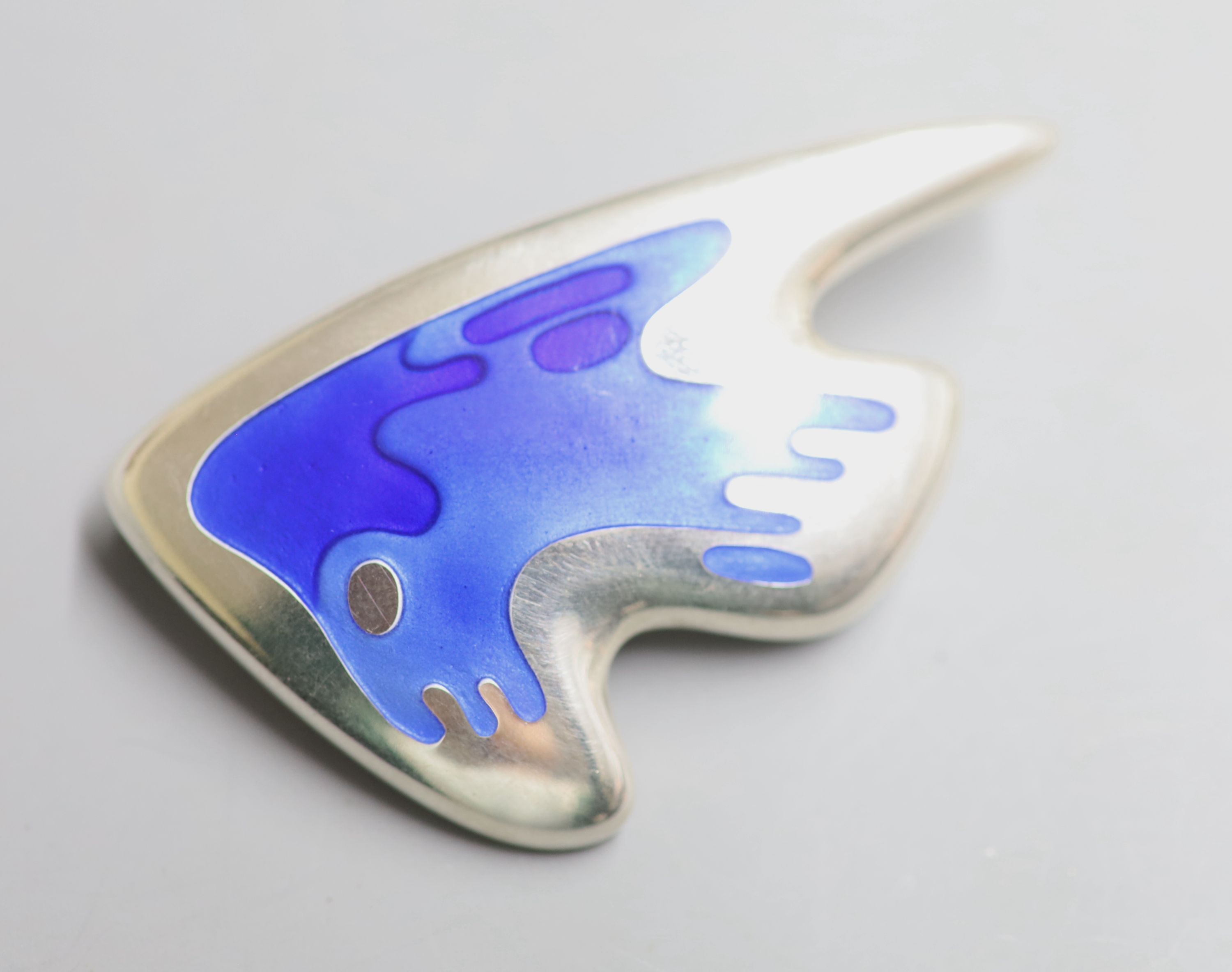 A Henning Koppel for Georg Jensen 925 and two colour blue enamel stylised fish brooch, design no. 307, 61mm, gross 30 grams.